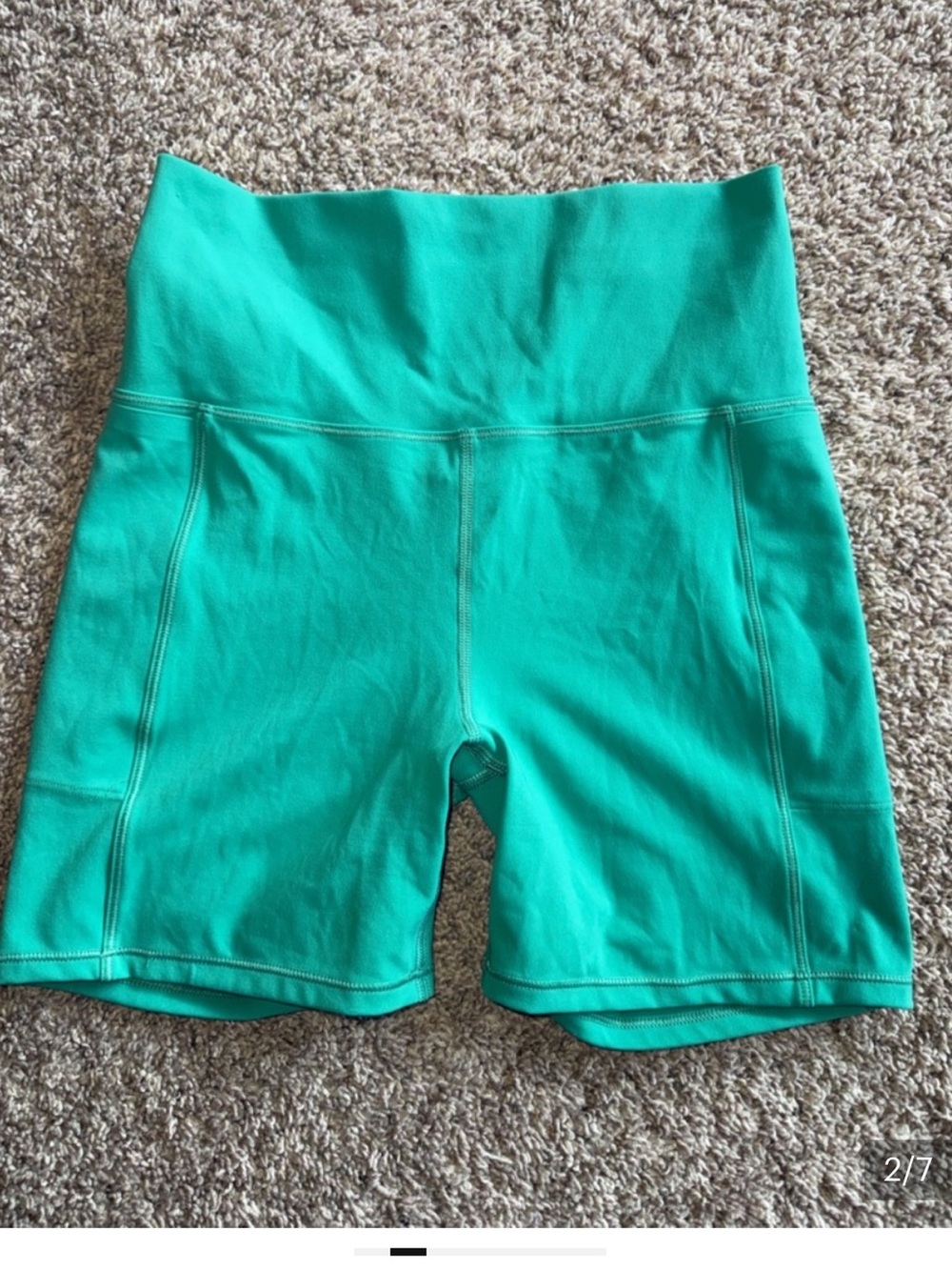 Vuori green spandex bike shorts with pockets size small